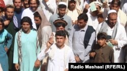 Ооганстан. Колуна визасын кармаган жарандар. Иллюстрациялык сүрөт.