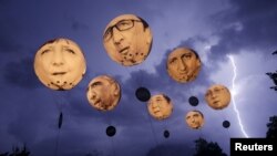 کمپین «وان» در زمان برگزاری اجلاس جی هفت در سال ۲۰۱۵ در باواریای آلمان،عکس تزئینی است