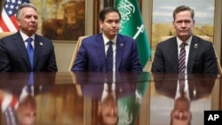 Сүйлөшүүгө катышкан америкалык делегация. 