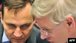 Радослав Сикорский (слева), Карл Бильдт (справа)