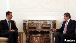 احمد داووداوغلو در دیدار با بشار اسد در روز سه‌شنبه