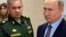 Министр обороны России Сергей Шойгу и Владимир Путин