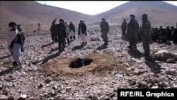 A video shows men stoning a woman in a hole to death in Afghanistan's Ghor province on October 25.