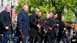 Vladimir Putin și lideri din alte foste republici sovietice, de la belarusul Aleksandr Lukașenko la uzbecul Shavkat Mirziyoyev, la vestivitățile de la Moscova de pe 9 mai 2023