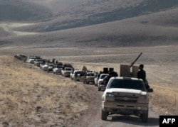 تصویر گروهی از شبه‌نظامیان جبهه نصرت را در مرز سوریه با لبنان نشان می‌دهد. این تصویر بیش از دو هفته پیش منتشر شده است.