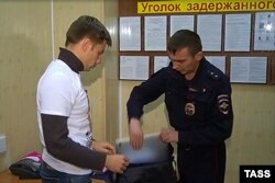 Олексій Гончаренко в райвідділку «Китай-город» у Москві, 1 березня 2015 року