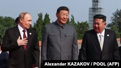 Зліва направо: Володимир Путін, Сі Цзіньпін та Кім Чен Ин