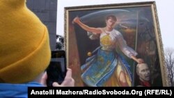 Картина харківського художника Іллі Паньока, на якій зображена Надія Савченко і Володимир Путін, під час мирної акції на підтримку української льотчиці, Харків, 6 березня 2016 року