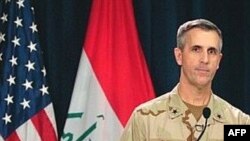 سخنگوی ارتش آمريکا می‌گويد که اين نظاميان اسلحه و بودجه خود را از ايران می‌گيرند و حتی در ايران آموزش می‌بينند. (عکس: AFP)