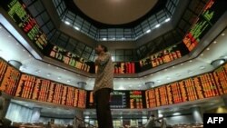 به دنبال بحران اقتصادی در جهان، ایران و سوریه گفته اند که اقتصاد «مستقل» شان کمتر از دیگر کشورها از این بحران لطمه می بیند. (عکس: AFP)