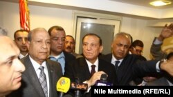 سامی حافظ عنان، مرکز تصویر، روز سه‌شنبه دستگیر شد.