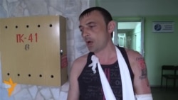 Украин күмерчесе тоткында ничек җәзаланганын сурәтли