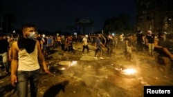 بغداد روز جمعه صحنه رویارویی نیروهای امنیتی با گروه‌های مختلف معترضانی بود که تلاش می‌کردند خود را به میدان تحریر برسانند
