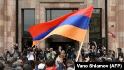 ARMENIA -- Opposition supporters shout in front of the Marriott hotel during Armenia's protest leader press conference in Yerevan, April 27, 2018