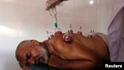 Пакистандагы хижама жасатып жаткан бейтап 