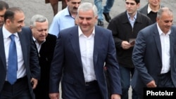 Armenia - Businessman Samvel Karapetian (center) arrives for the consecration of a new church in Abovian, May 14, 2013.