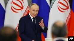 Владимир Путин, раисҷумҳури Русия.