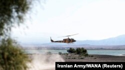 A helicopter is seen during an Iranian Army exercise dubbed "Fatehan of Kheibar", in the northwestern parts of Iran, in this picture obtained on October 1, 2021.