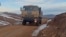 An Azerbaijani military vehicle moves along a road in the Kalbacar region on November 25.