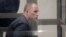 Alyaksandr Asipovich appears in court on May 14. 