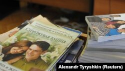 «Жахабанын күбөлөрүнүн» китептери. Иллюстрациялык сүрөт.