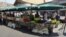 Armenia - Farmers sell fruits and vegetables at an agricultural market in Yerevan, 18Aug2012.