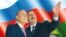 Плакат в Азербайджане: Гейдар Алиев и Ильхам Алиев