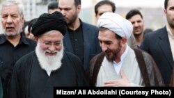 احمد علم‌الهدی (چپ) در کنار رئیس کل دادگستری خراسان رضوی