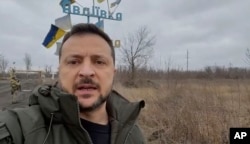 Ukrainian President Volodymyr Zelenskiy is shown in Avdiyivka on December 29.