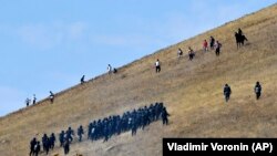 Во время операции в селе Кой-Таш. 8 августа 2019 года. 