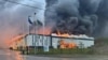 An industrial park burns in Lviv on October 5 following a Russian missile strike. 