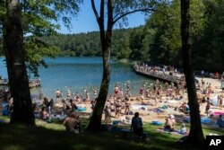 Пляж на возеры пад Вільняй. Ілюстрацыйнае фота