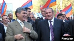 Armenia - Opposition leaders Levon Ter-Petrosian (R) and Aram Sarkisian (L) lead a demonstration in Yerevan, 28Apr2012