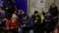 People take shelter inside a subway station during an air-raid alert in Kyiv on January 8.