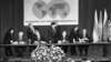 Leaders of Russia, the United States, Ukraine, and Britain sign the Budapest Memorandum, giving Kyiv security guarantees, in the Hungarian capital in December 1994