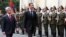 Armenia -- The presidents of Armenia and Syria inspect a guard of honor outside the presidential palace in Yerevan on June 17, 2009.