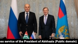 Аслан Бжания и Виталий Савельев