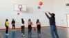 Armenia - Children play basketball at a school in the town of Gavar, March 9, 2021.