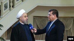 Роухани мамлекеттик телеге интервью берүүдө. Тегеран, 24-ноябрь, 2014-жыл.