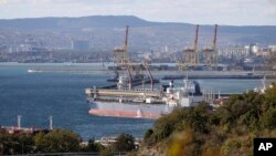 An oil tanker is moored at the Sheskharis complex, part of Chernomortransneft JSC, a subsidiary of Transneft PJSC, in Novorossiysk, Russia. (file photo)