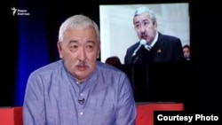 Исхак Масалиев.