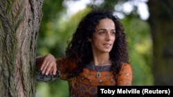 مسیح علی‌نژاد در اکتبر ۲۰۱۳ در لندن