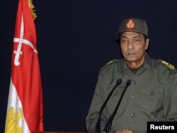 Египеттин куралдуу күчтөрүнүн Жогорку Кеңешинин төрагасы, фелд-маршал Хусейн Тантави 22-ноябрда элге кайрылып, сөз сүйлөөдө.