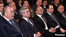 Armenia - President Serzh Sarkisian (second from left) and General Manvel Grigorian (L) attend a congress of the Yerkrapah Union of Nagorno-Karabakg war veterans in Yerevan, 18Feb2012.