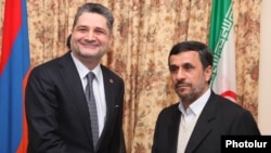 Armenia - Prime Minister Tigran Sarkisian (L) meets with Iran's visiting President Mahmud Ahmadinejad, 23Dec2011.