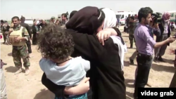 تصویری از گروهی از ایزدیان آزادشده از دست داعش در کرکوک