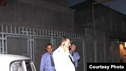 Armenia -- Police officers guard the offices of the Prosperous Armenia Party in Yerevan's Silikian neighborhood hours after its activists reportedly clashed with local members of the ruling Republican Party on May 18, 2009. Photo by Gagik Shamshian.