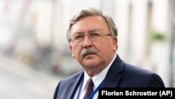 مخائیل اولیانوف در جریان گفت‌وگوهای هسته‌ای در وین در ۲۲ خرداد امسال