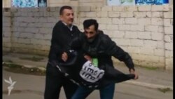 İŞİD bayraqdarı  mitinqdə saxlandı