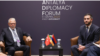 Turkey - Turkish envoy Serdar Kilic (left) and Armenian parliament vice-speaker Ruben Rubinian meet on the sidelines of the Antalya Diplomatic Forum, April 11, 2025.